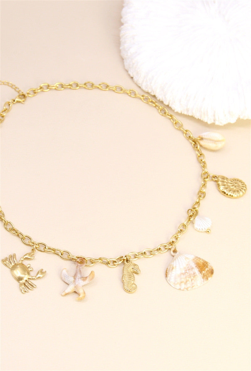 Collier chaîne breloques faune marine doré