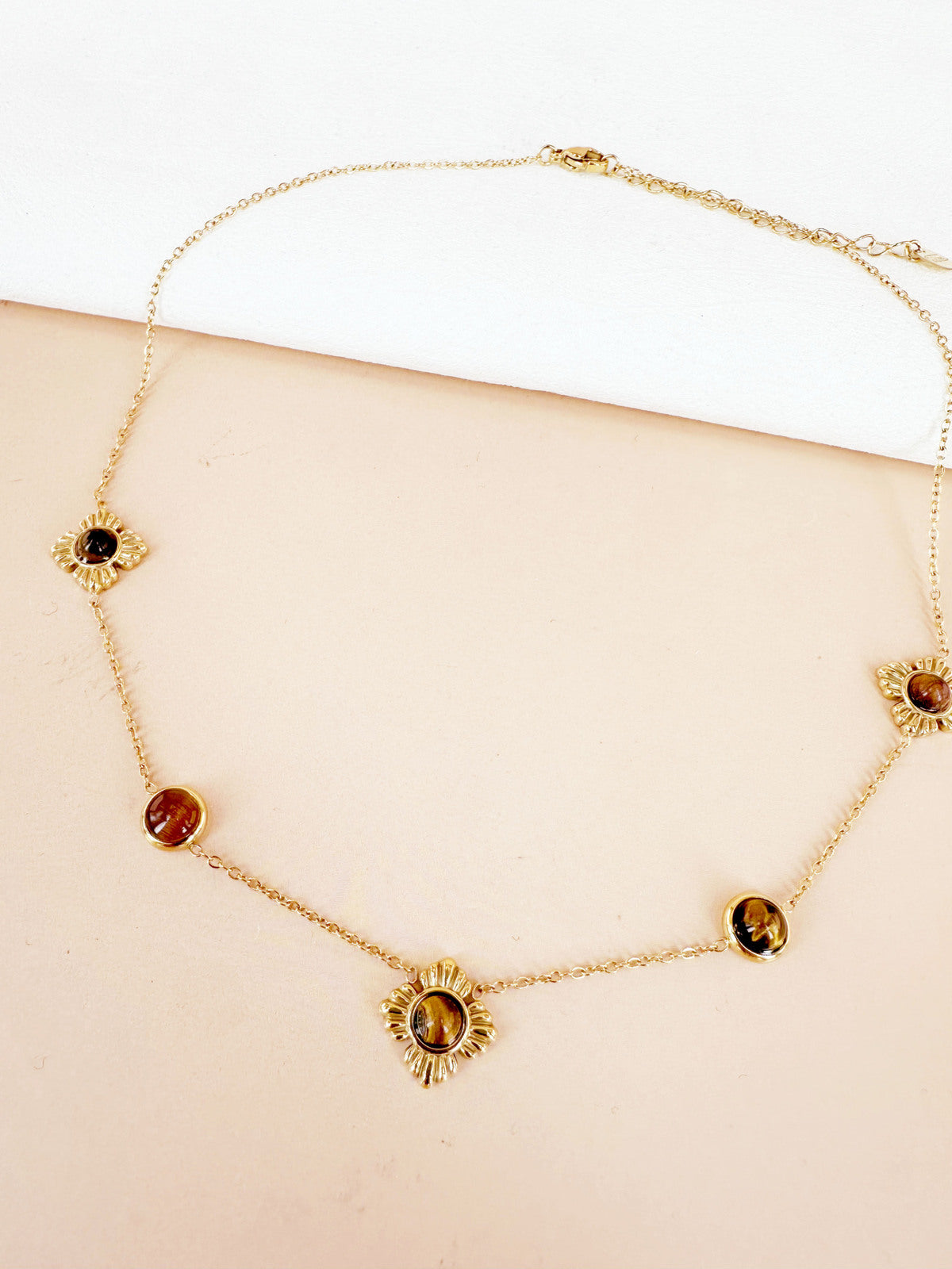 Collier soleils pierres marron doré