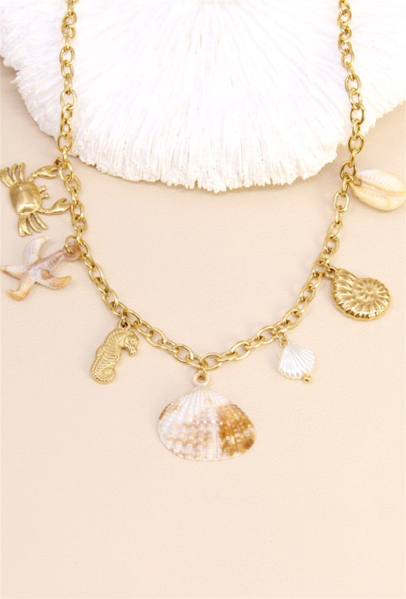 Collier chaîne breloques faune marine doré
