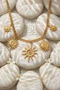 Collier soleils et lunes breloques doré