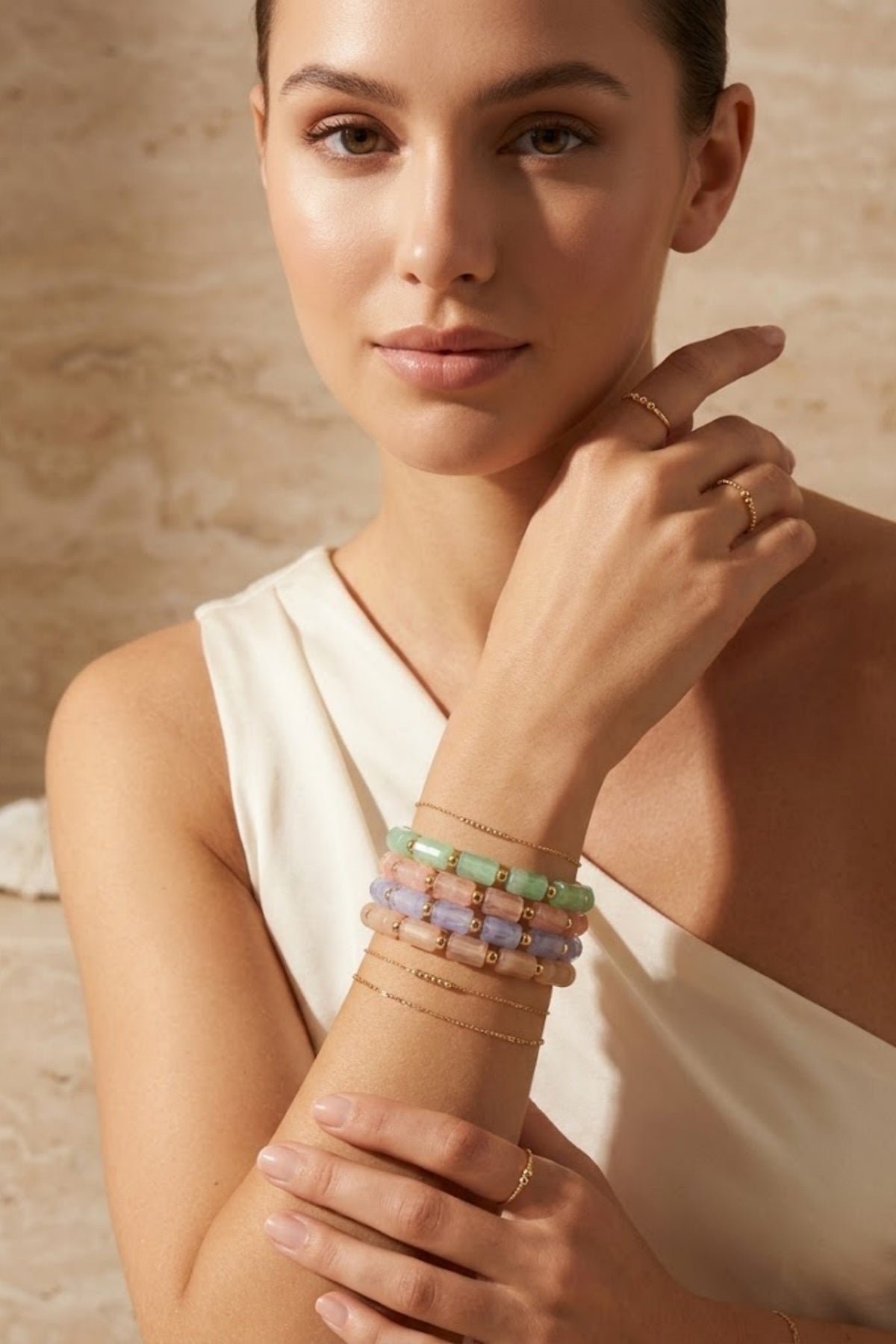 Bracelet perles cylindriques rose doré