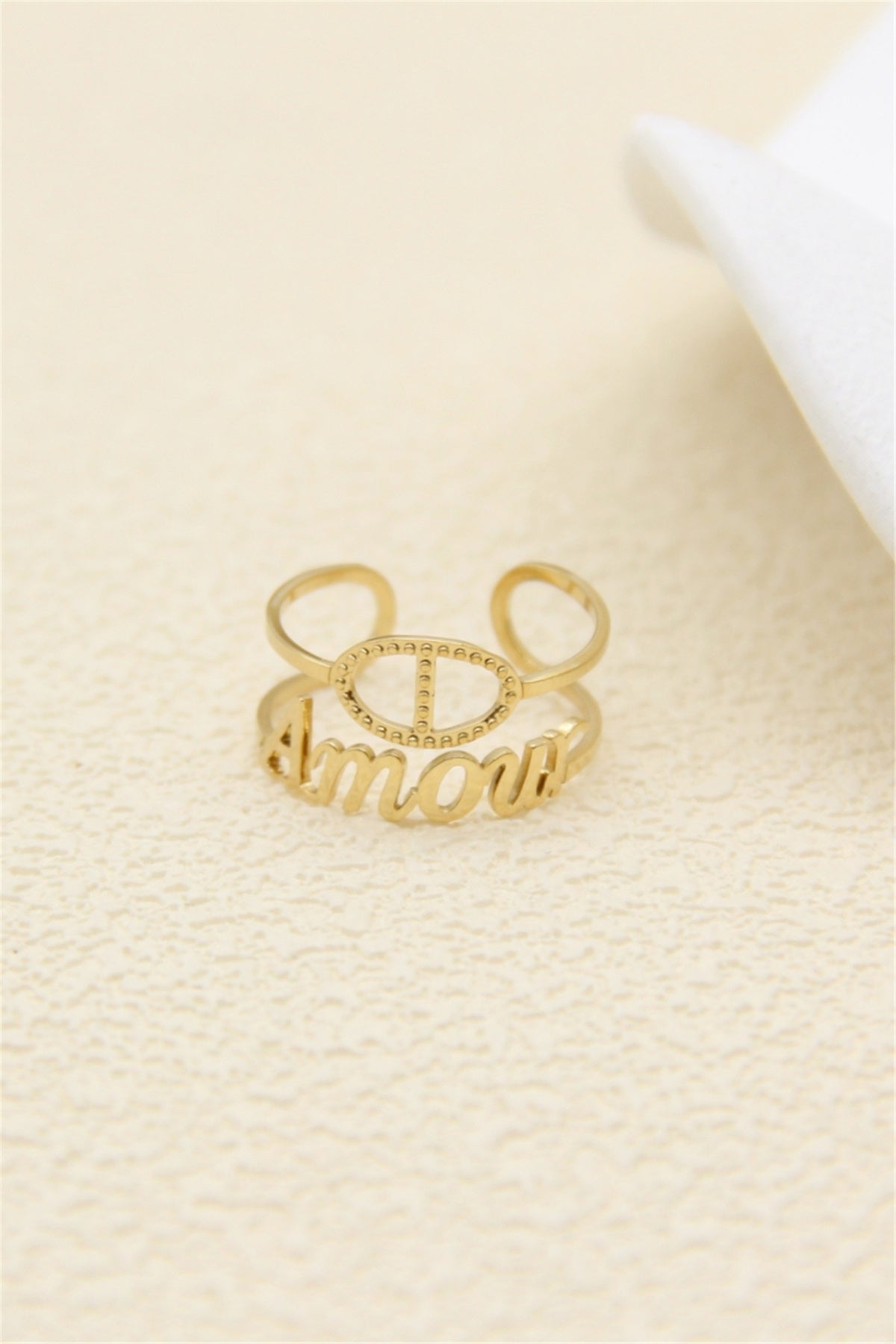Bague ouverte dorée double anneau Amour et maille marine