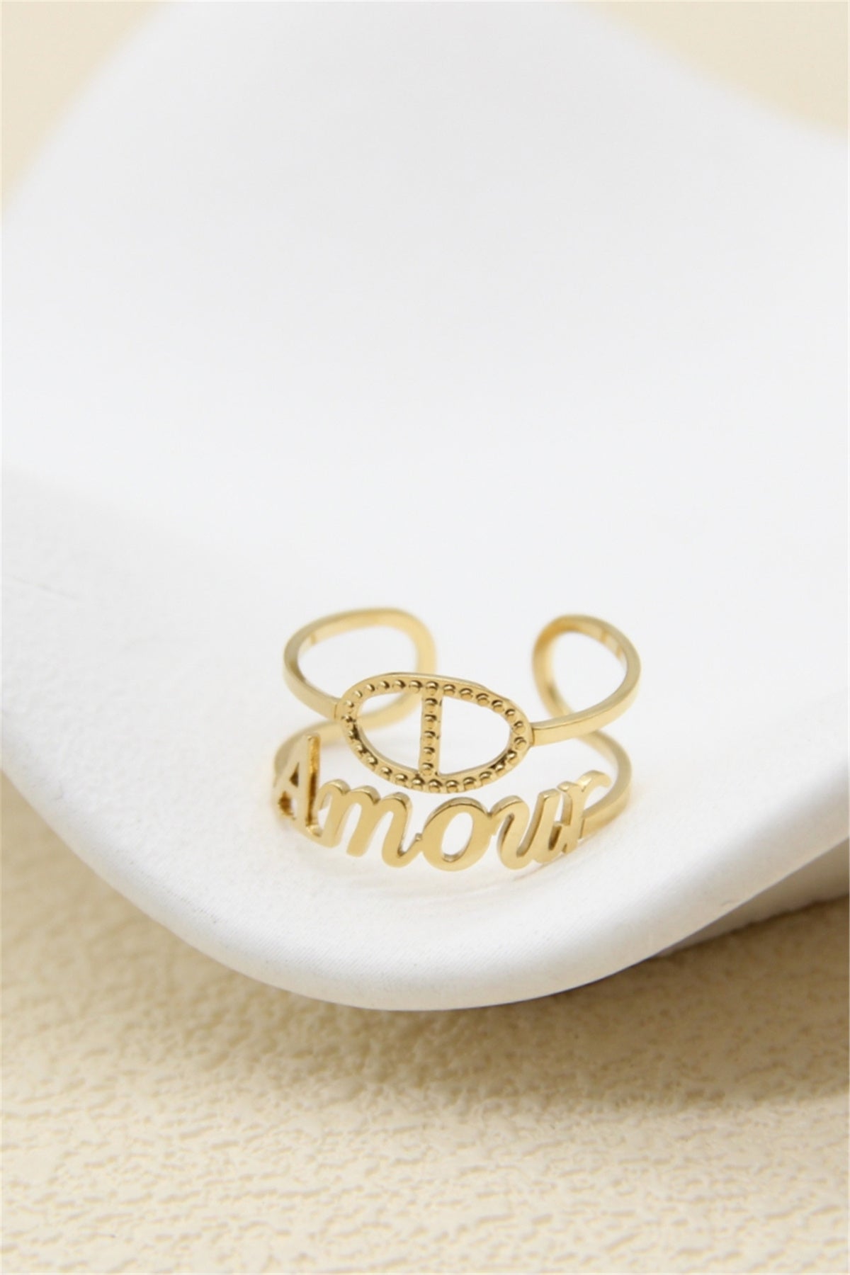 Bague ouverte dorée double anneau Amour et maille marine