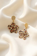 Boucles d'oreilles pendantes fleur dorée motif léopard