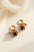 Boucles d'oreilles créoles dorées breloques goutte effet écaille et perle fleurie