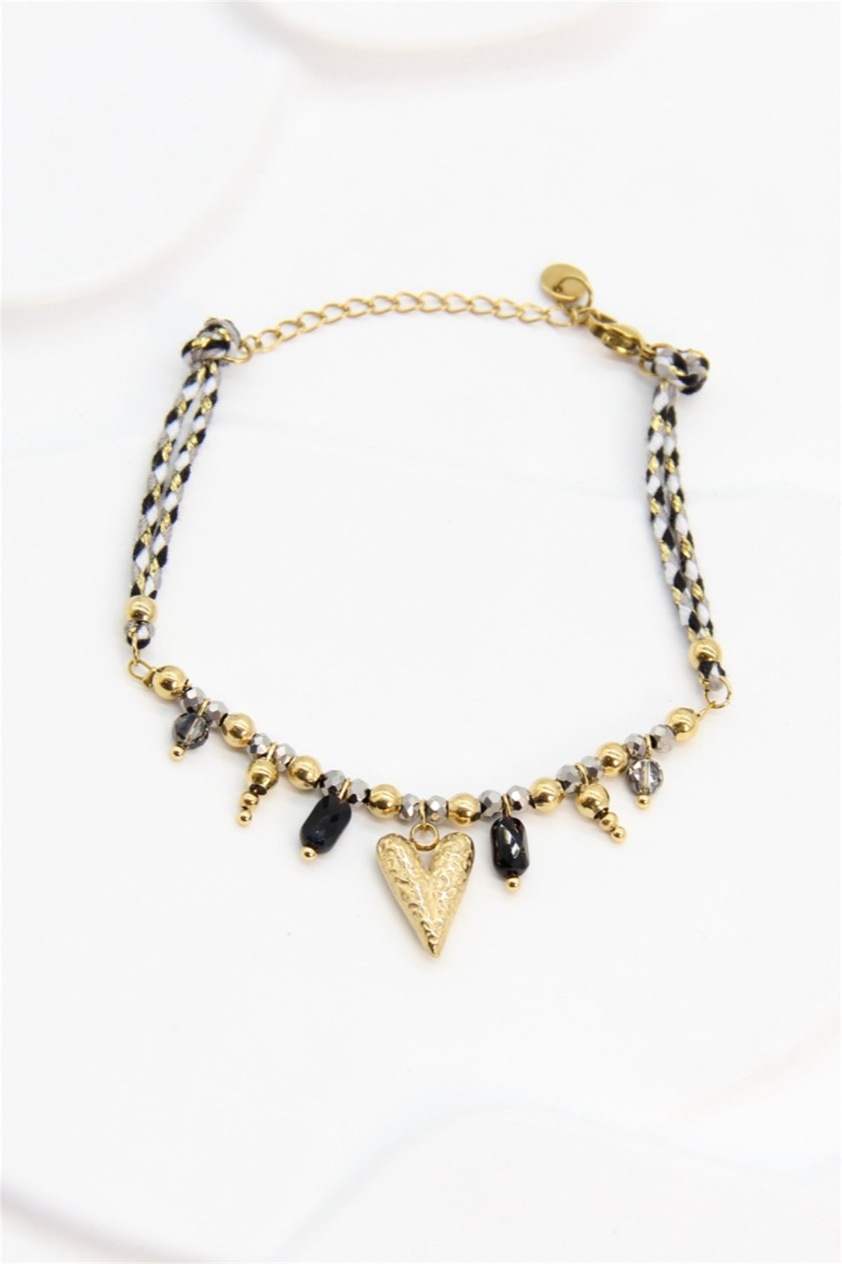 Bracelet tressé noir et doré perles cristal et charm cœur doré