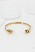 Bracelet jonc ouvert à nœuds dorés