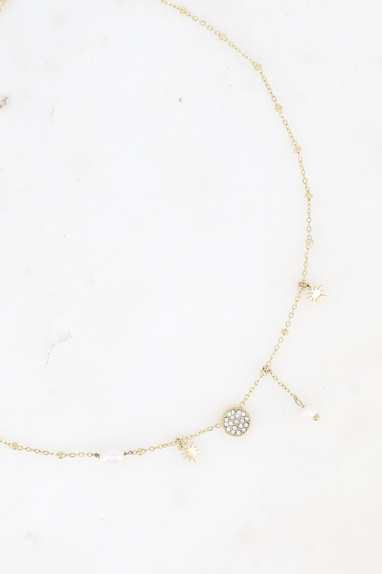Collier chaîne dorée pampilles étoiles oxydes de zirconium et perles d'eau douce