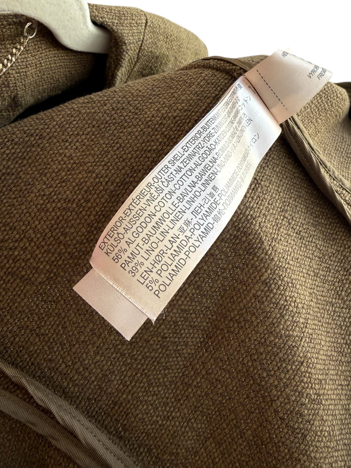 Massimo Dutti structured brown jacket with zip closure, round neck, and chain detail. Made from cotton, linen, and polyamide.