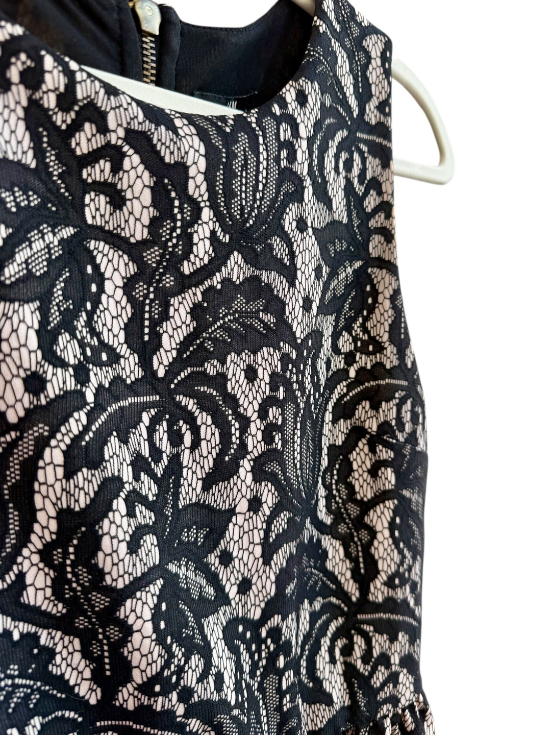ReTrend black lace sleeveless dress with nude lining, round neck, zip back, size S. Elegant flared skirt.