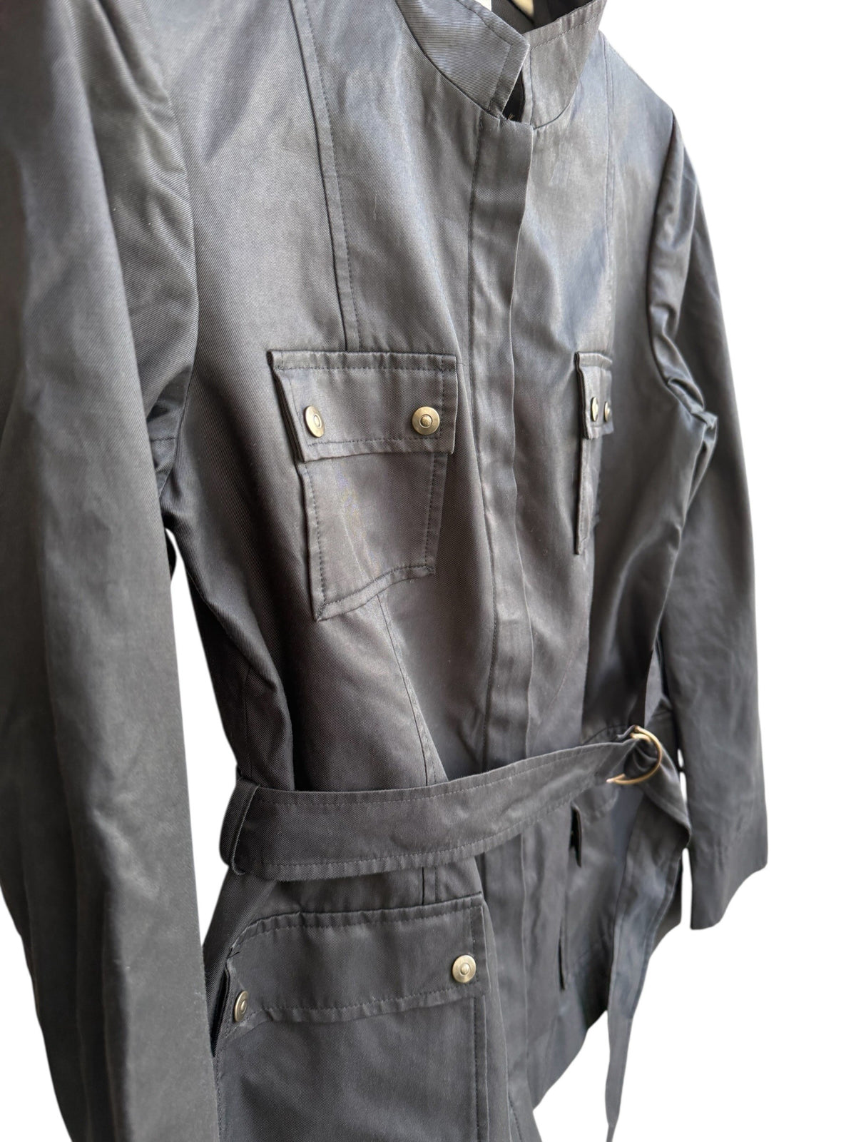 ReTrend black structured canvas jacket with stand-up collar, discreet closure, belted waist, and buttoned flap pockets. Size 40.