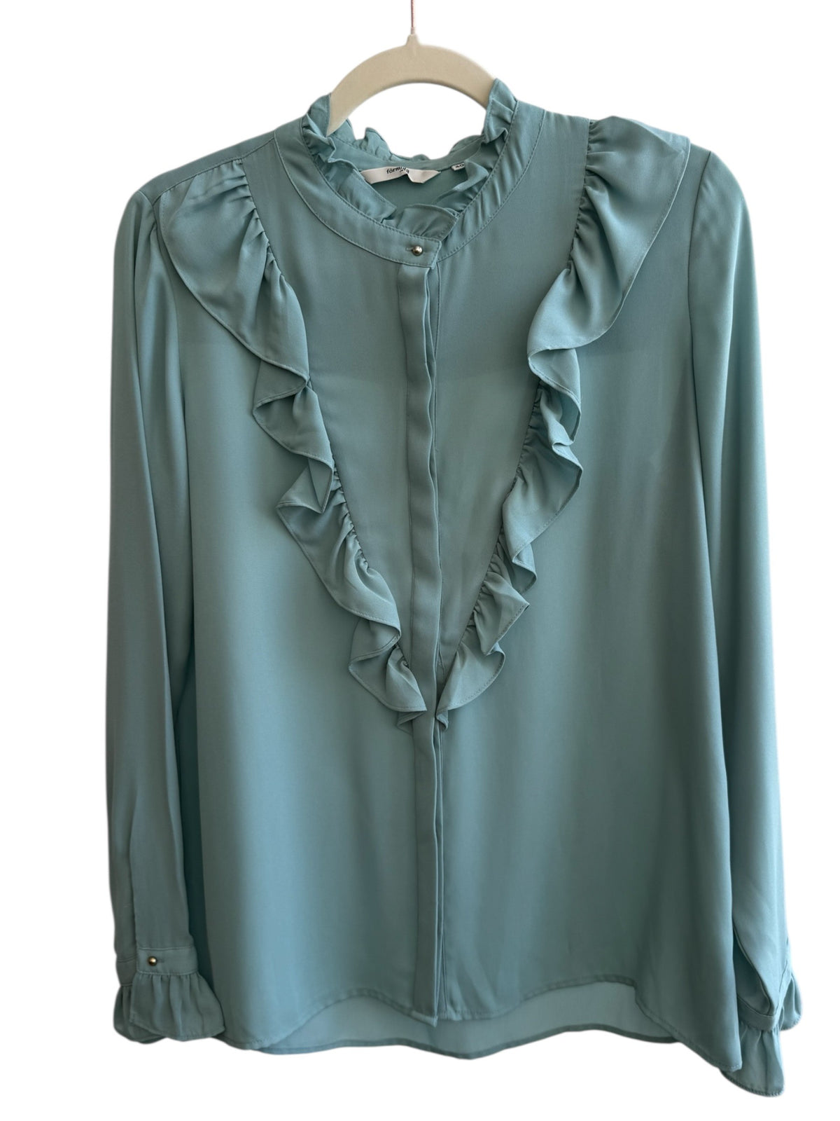ReTrend Formula Joven light blue flowing blouse with ruffled high neck, ruffled front, and ruffled cuffs. Size 40.