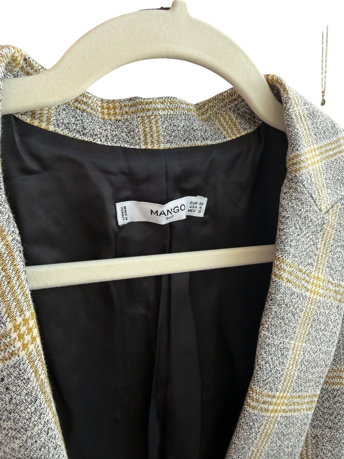 ReTrend blazer with grey and yellow plaid pattern, structured straight cut, tailored collar, and single button closure. Size 36.