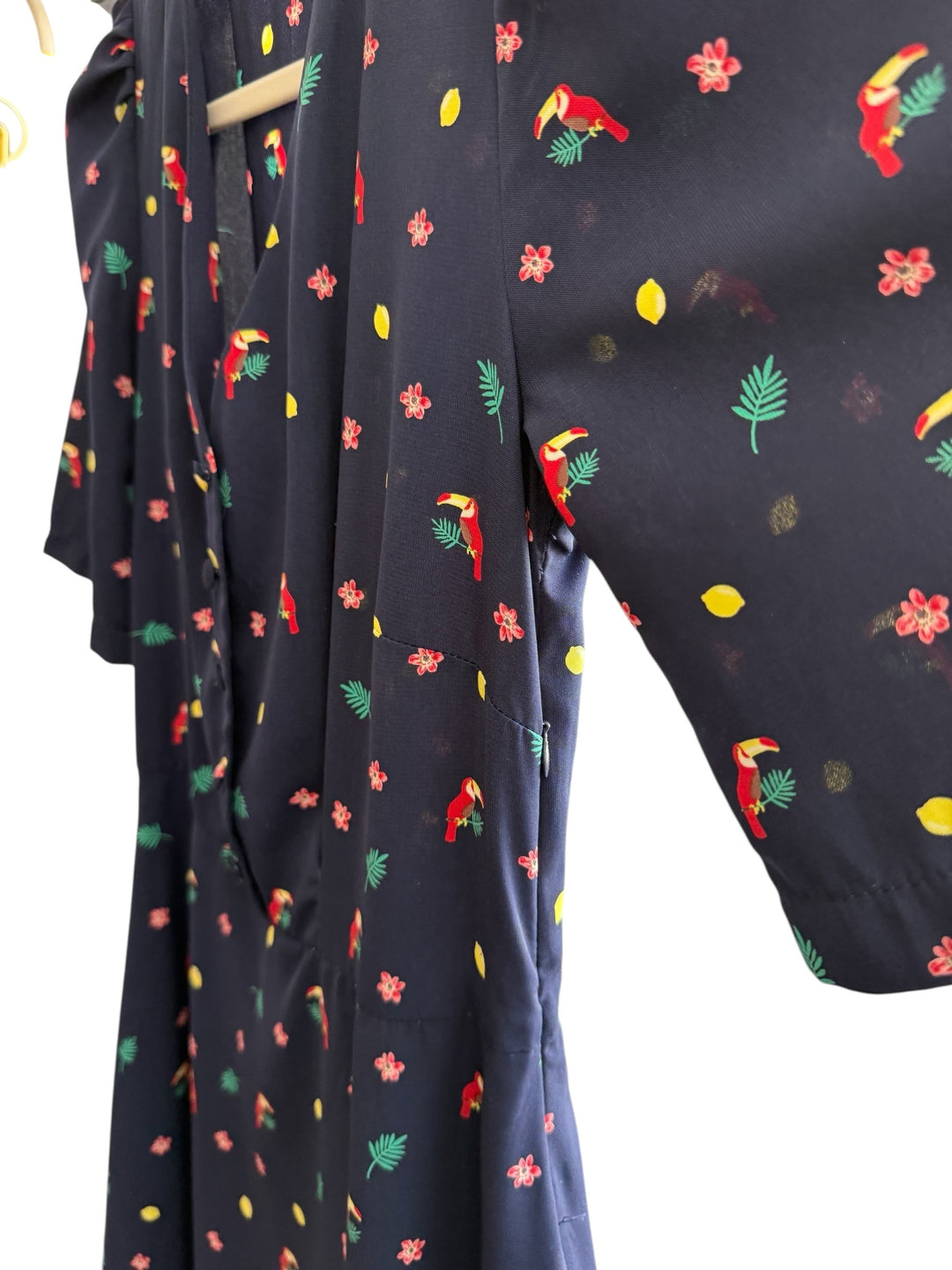 ReTrend navy blue fluid dress size 36 with toucan, flower and lemon print. V-neck, marked waist, mid-length sleeves.