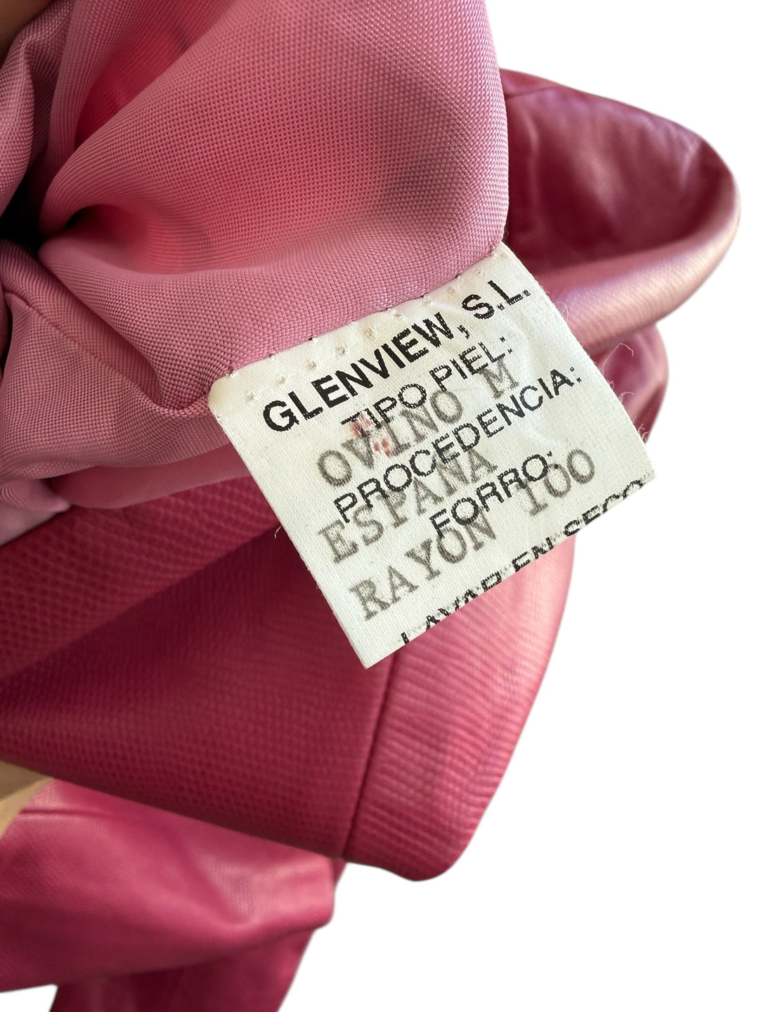 ReTrend raspberry pink 100% leather blazer, size 38, with a fitted cut and covered buttons.