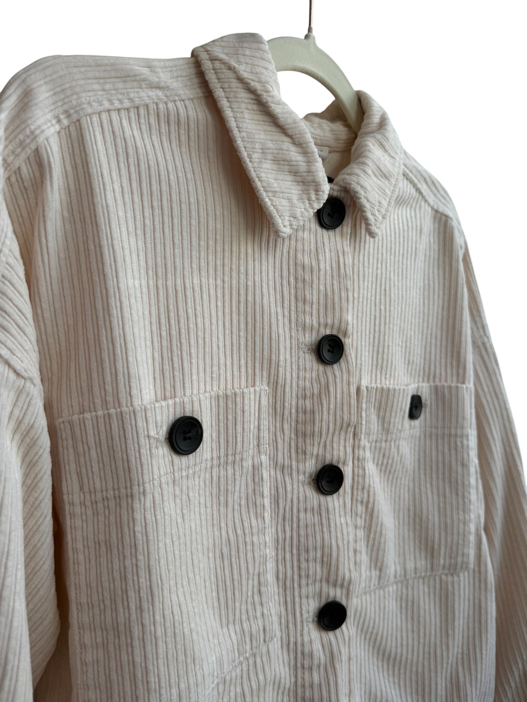 ReTrend beige corduroy jacket, size S. Straight, slightly oversized fit with large chest pockets and black buttons.