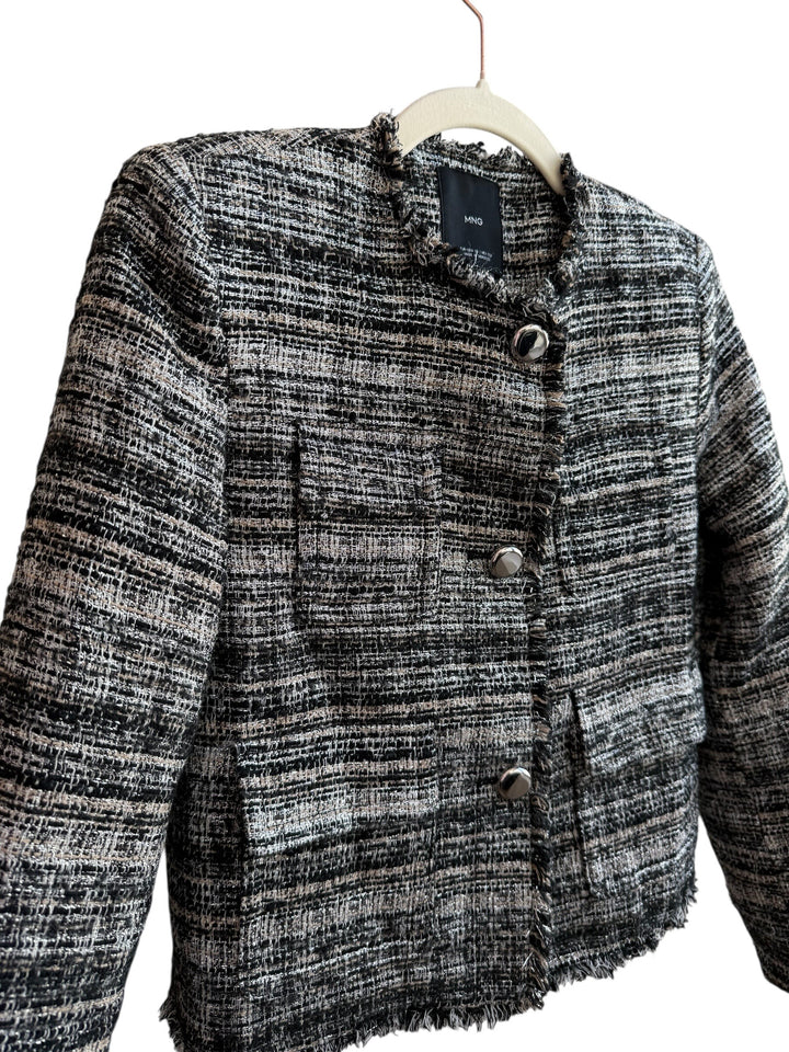 Retrend black and beige tweed jacket, size XS, with frayed edges and metallic buttons. Short, structured cut.