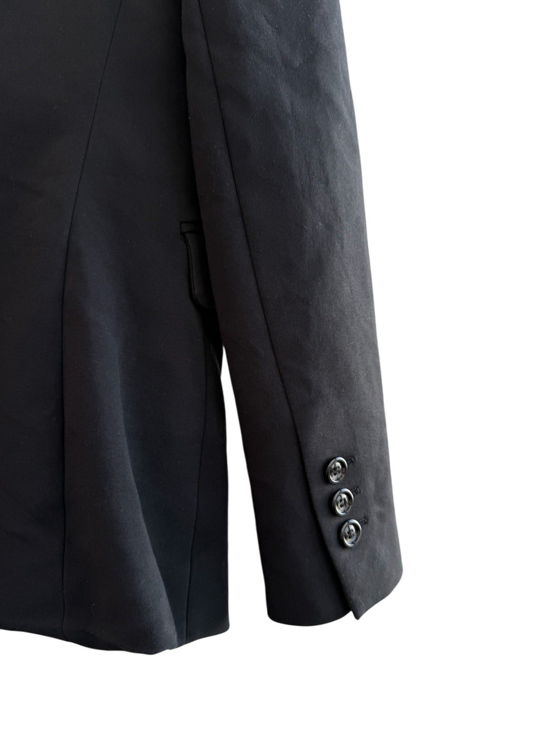 ReTrend black classic blazer with structured shoulders, tailored collar, and button closure. Size XS.