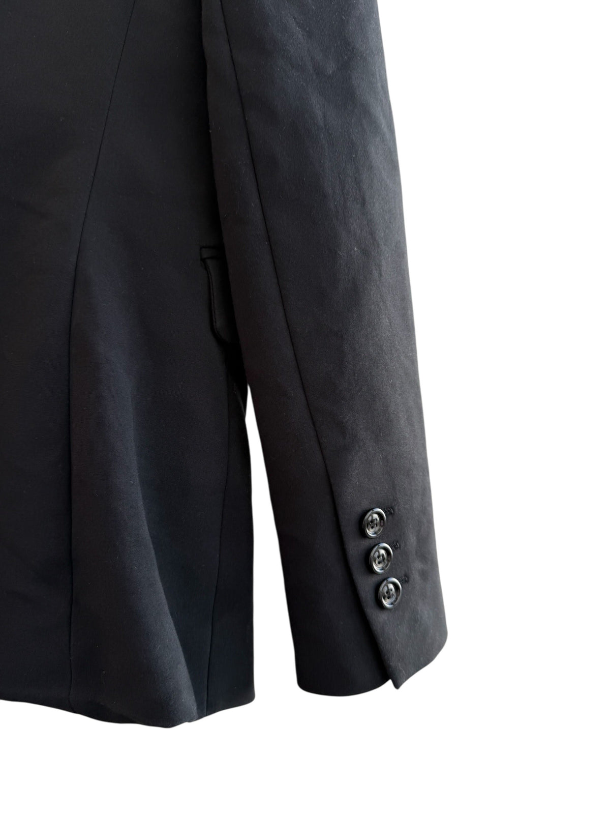 ReTrend black classic blazer with structured shoulders, tailored collar, and button closure. Size XS.