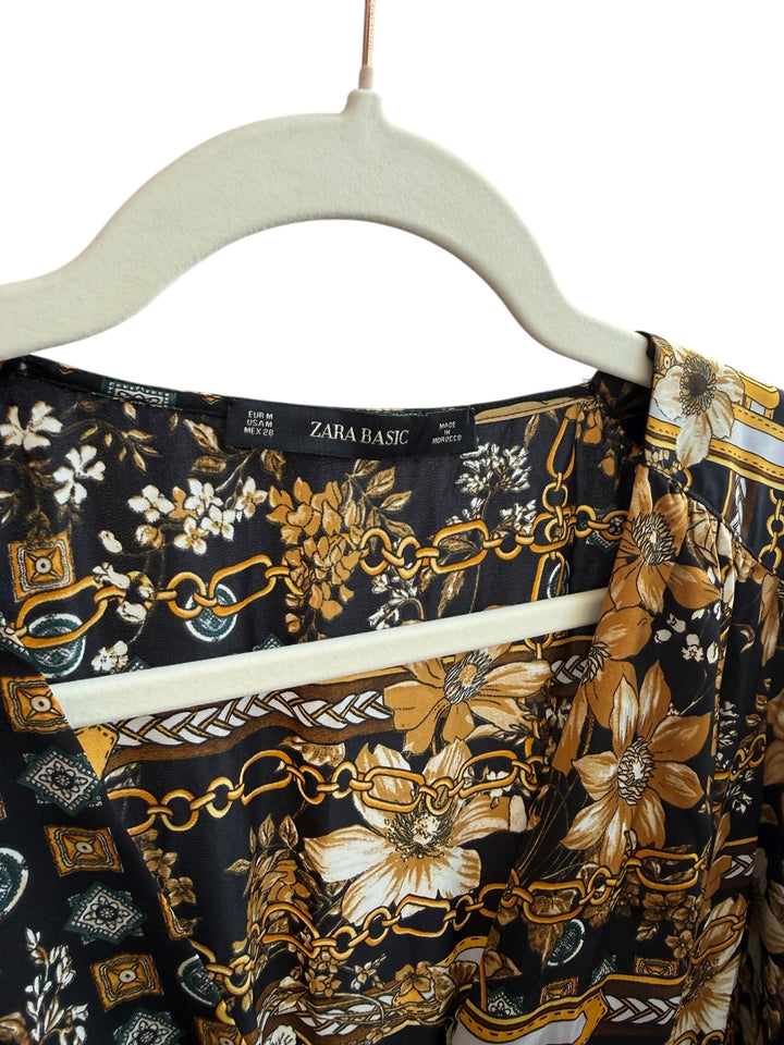ReTrend black flowing midi dress size M with scarf print, gold chains, flowers, and button front.