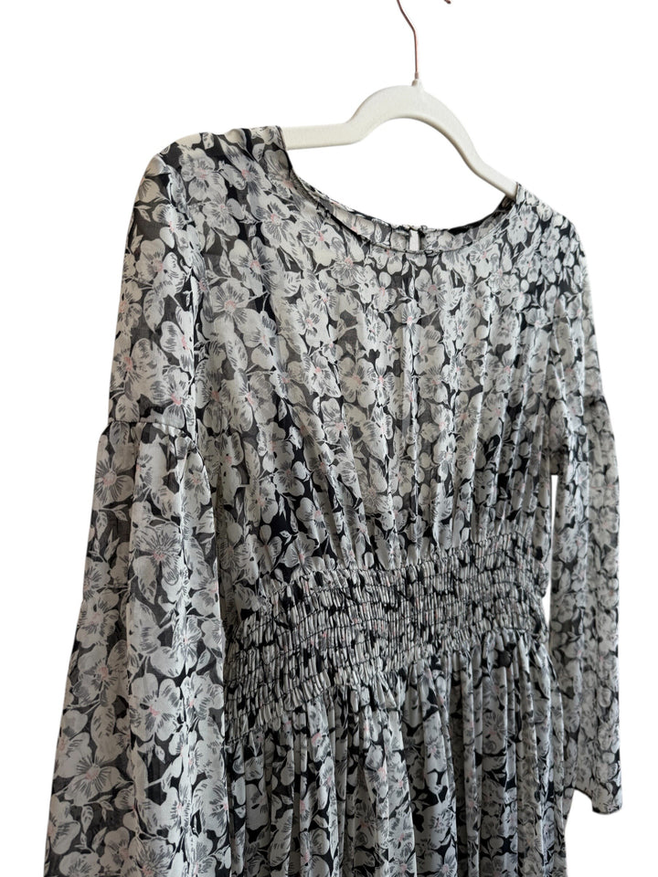 ReTrend black floral print chiffon dress with smocked waist and long sleeves, size M.