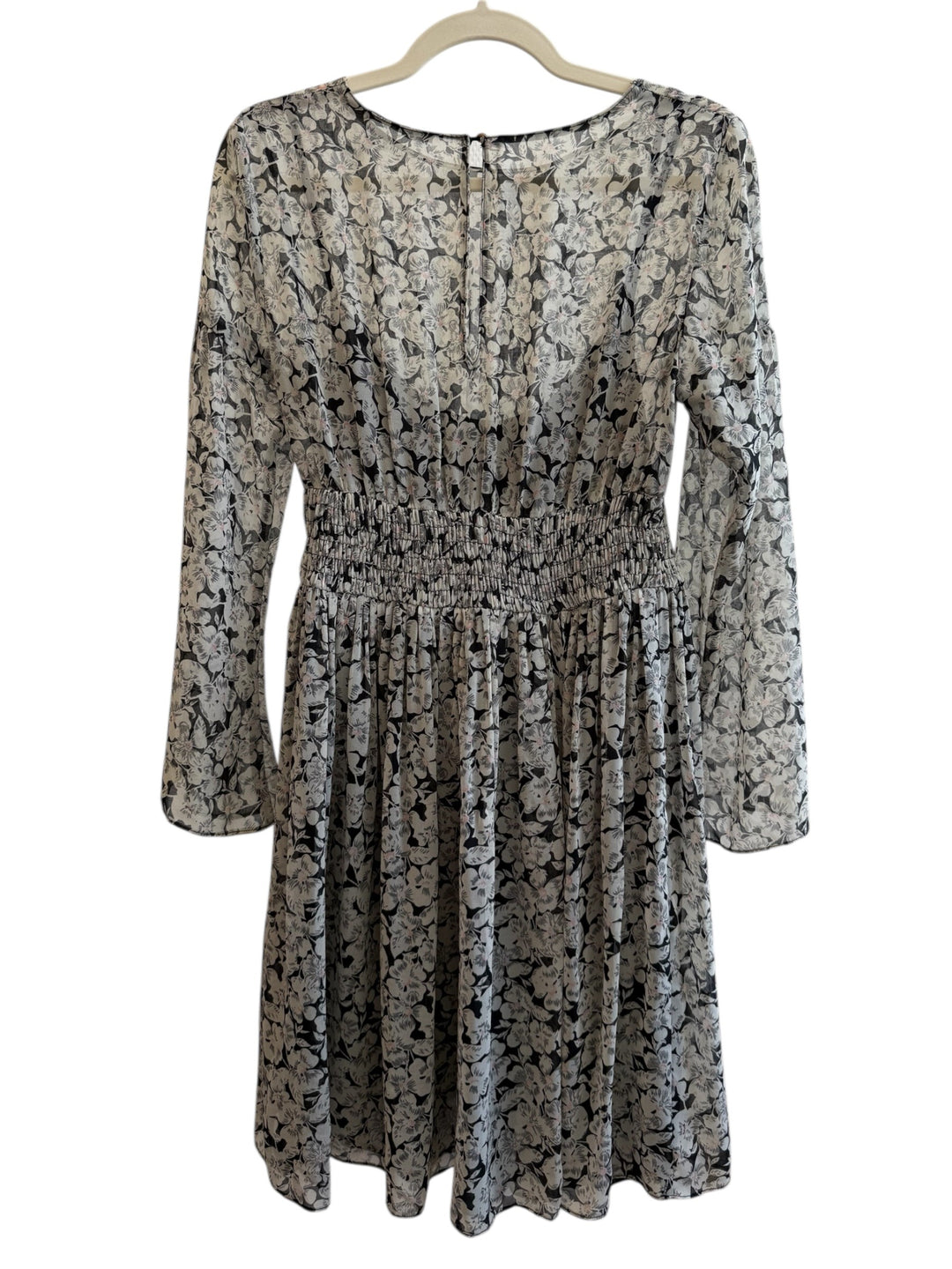 ReTrend black floral print midi dress with smocked waist, long sheer sleeves, and round neckline. Size M.