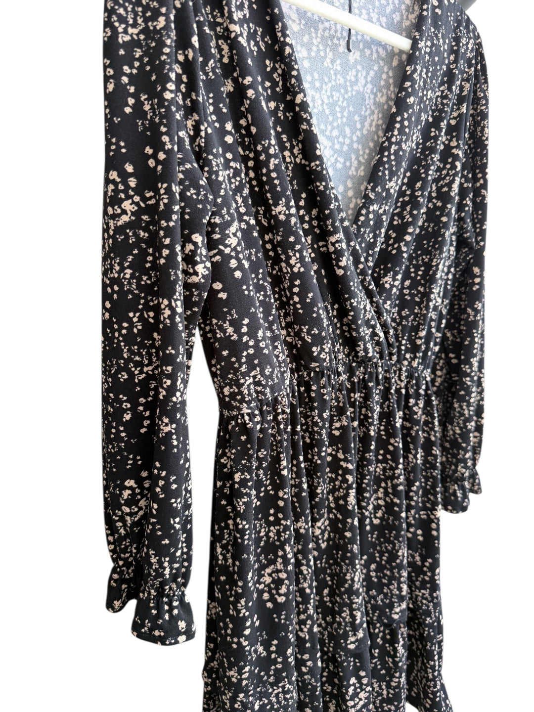 ReTrend black floral print wrap dress with smocked cuffs and marked waist, size S.