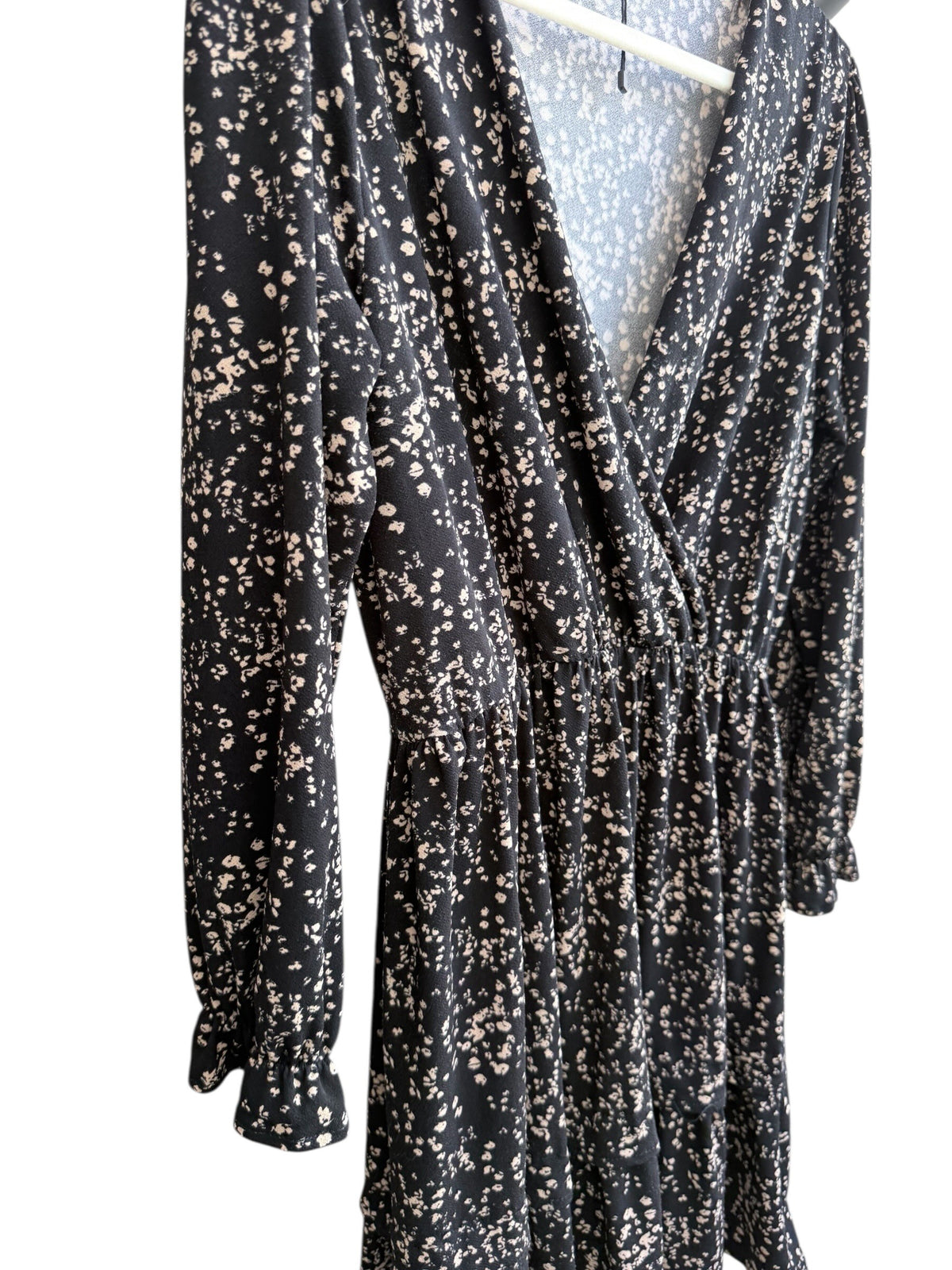 ReTrend black floral print wrap dress with smocked cuffs and marked waist, size S.
