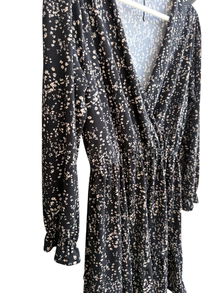 ReTrend black floral print wrap dress with smocked cuffs and marked waist, size S.