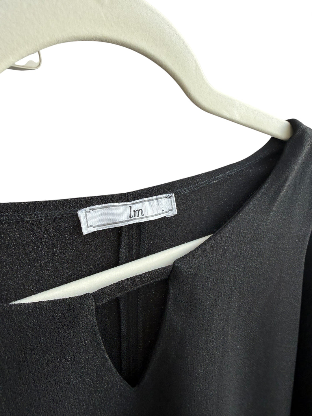 ReTrend black fluid minimalist dress size L with gold trim on sleeves and pockets.
