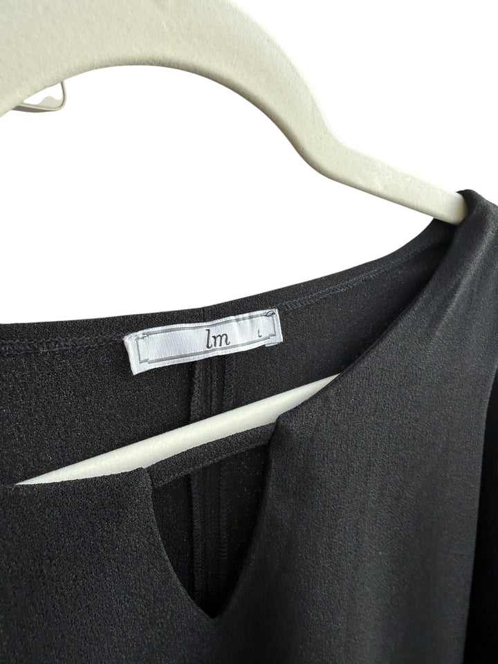 ReTrend black fluid minimalist dress size L with gold trim on sleeves and pockets.
