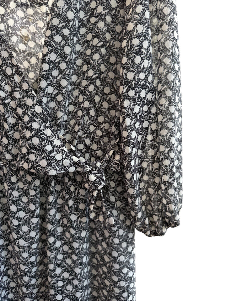 ReTrend black and ecru graphic print midi dress with wrap front, 3/4 sleeves, and tie waist.