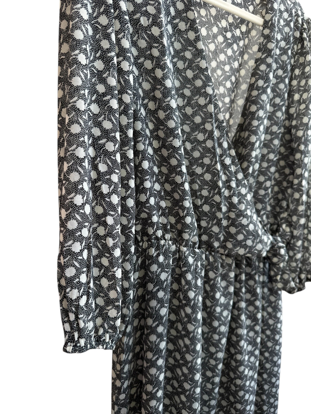 ReTrend black and ecru graphic print midi dress with a wrap neckline and 3/4 sleeves.