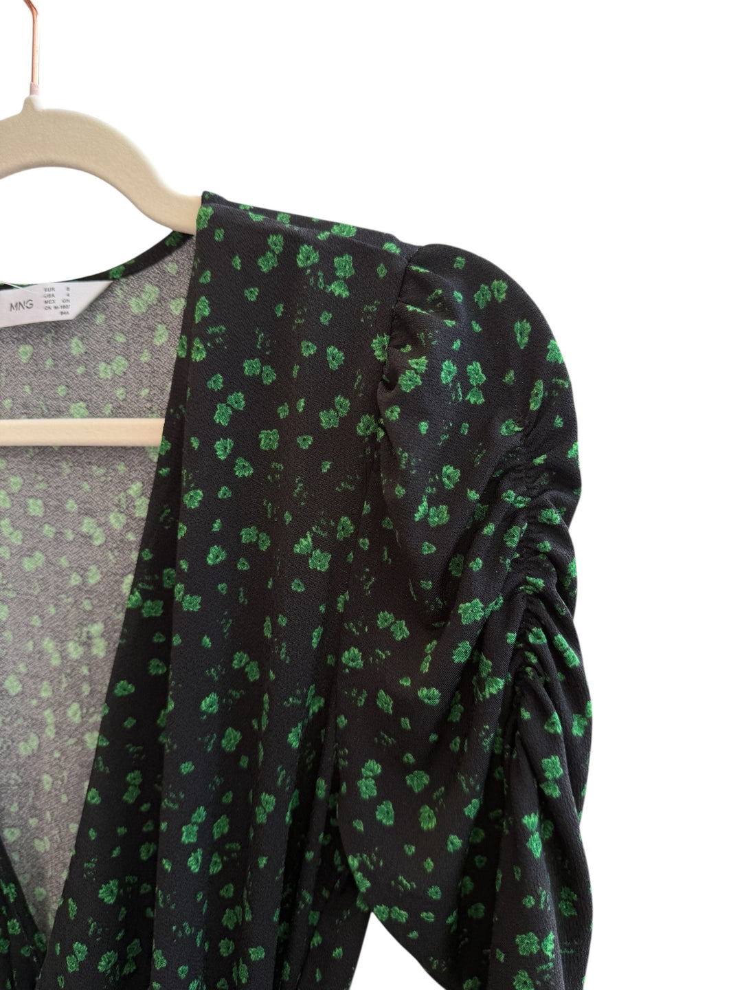 Retrend black floral print dress with green pattern, V-neck, long puffed sleeves, and tie waist. Size S.