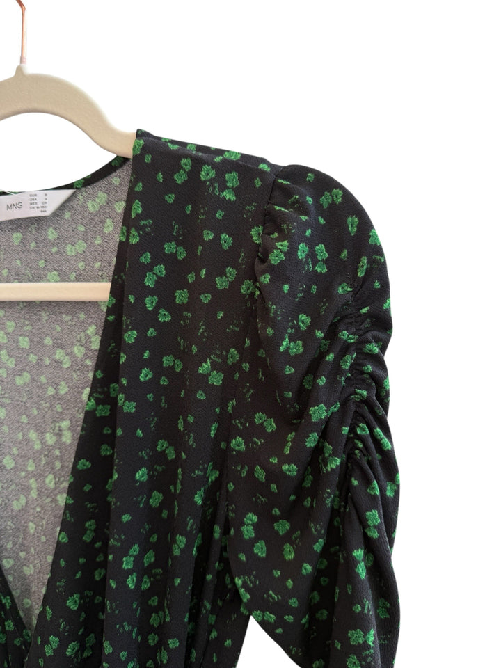 Retrend black floral print dress with green pattern, V-neck, long puffed sleeves, and tie waist. Size S.