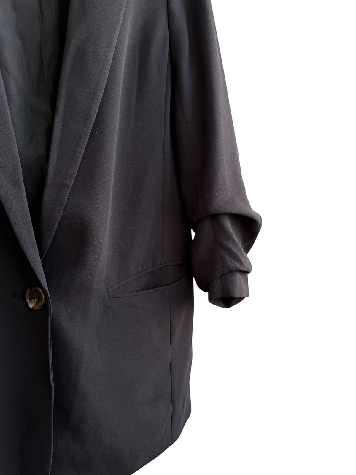 ReTrend black H&M blazer, size 36, slightly oversized fit with cuffed sleeves and single button closure.