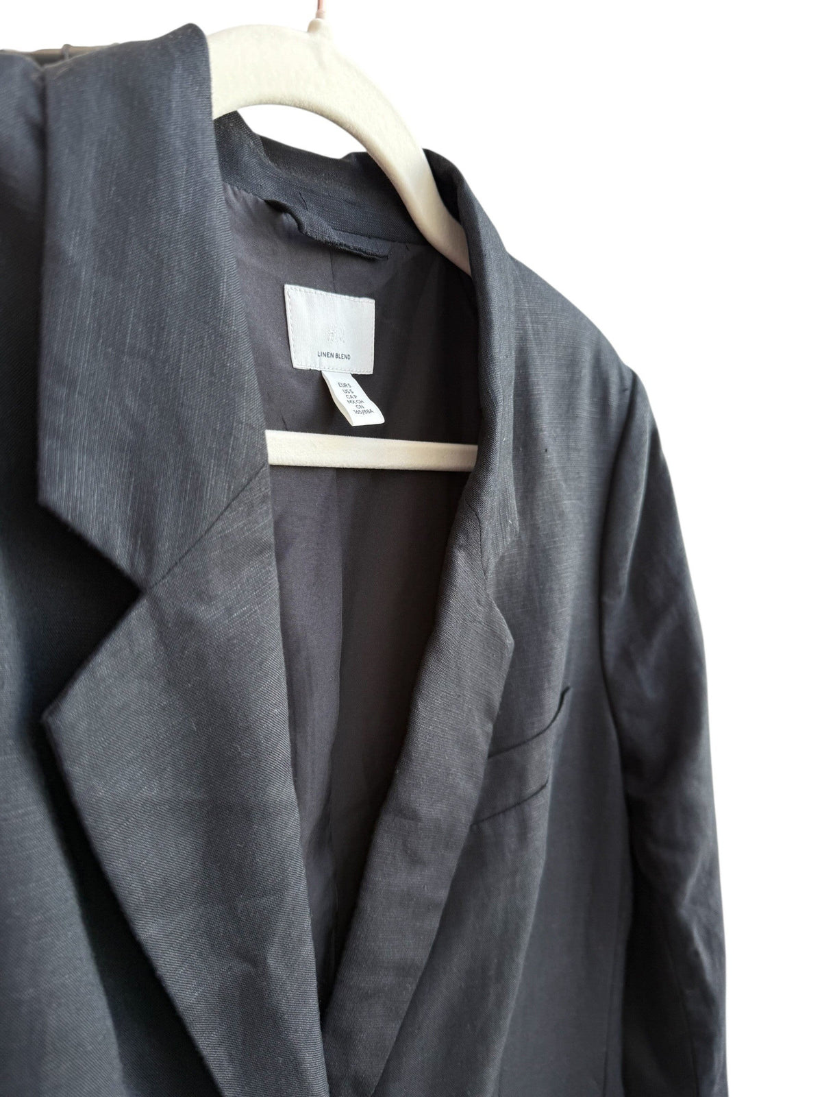 ReTrend black linen-blend oversized blazer with lapel collar and flap pockets. Size S.