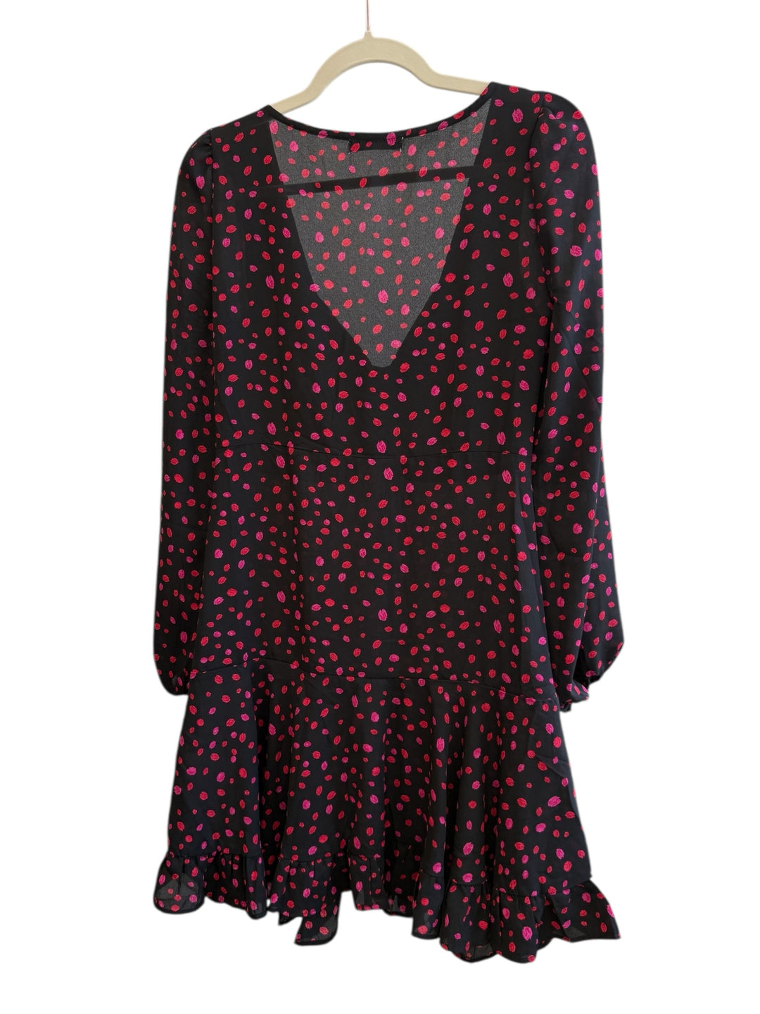 ReTrend black and pink polka dot dress, size 36, with plunging V-neck, long sleeves, and ruffled hem.