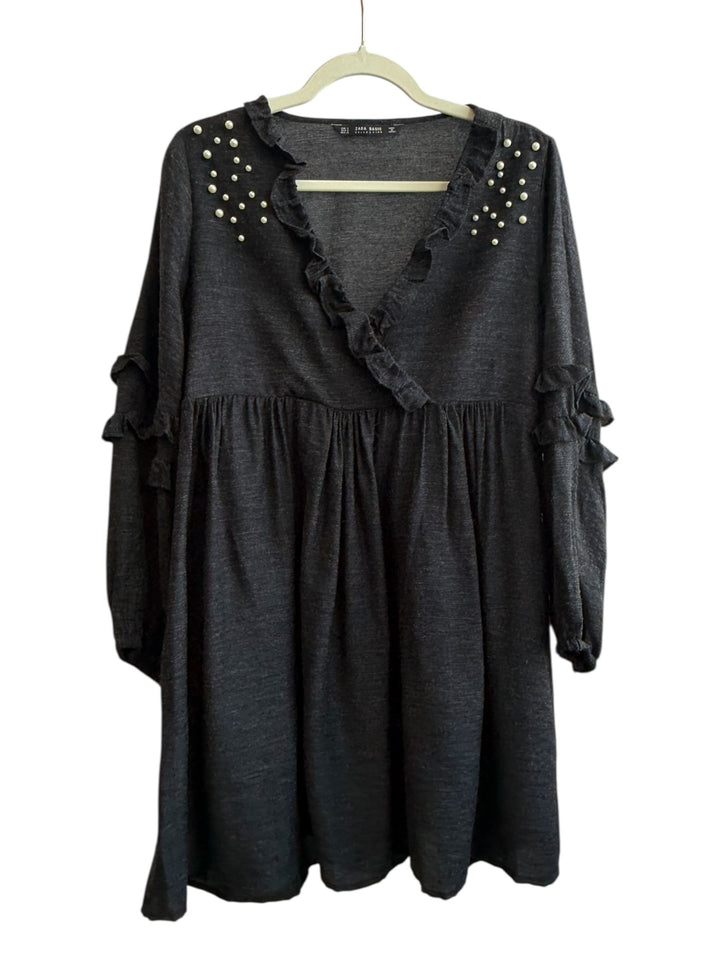 ReTrend Zara black fluid dress with ruffled V-neck, pearl details on shoulders, and ruffled cuffs. Size S.