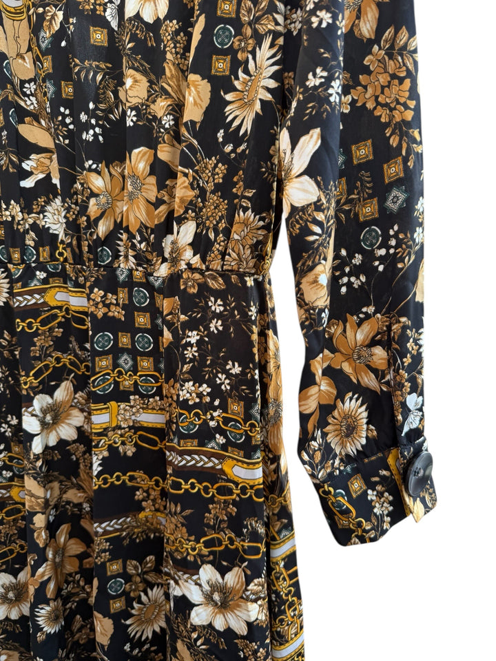 ReTrend black flowing midi dress size M with scarf print, chain and floral details, and button front closure.