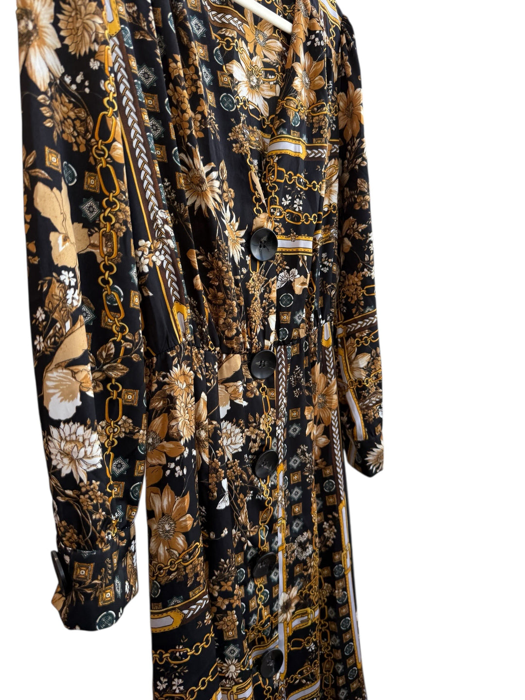 ReTrend black flowing midi dress size M with scarf print, chain and floral details, and button-front closure.