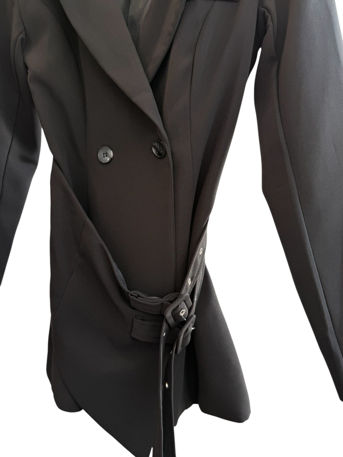 ReTrend black structured blazer with integrated belt, tailored fit, lapel collar, double-breasted, and decorative sleeve buttons. Size S.