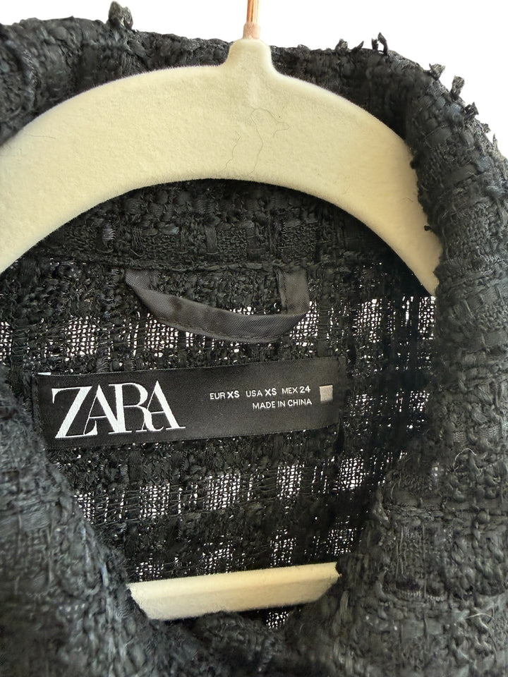 ReTrend black textured tweed-effect shirt jacket with chest pockets and metal buttons, size XS.