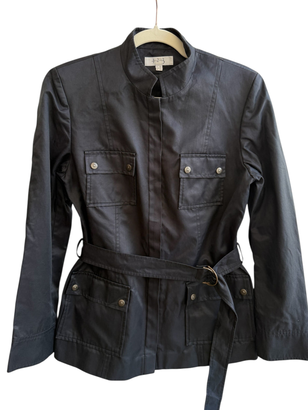 ReTrend black structured twill jacket with mandarin collar, discreet button closure, belted waist, and buttoned flap pockets. Size 40.