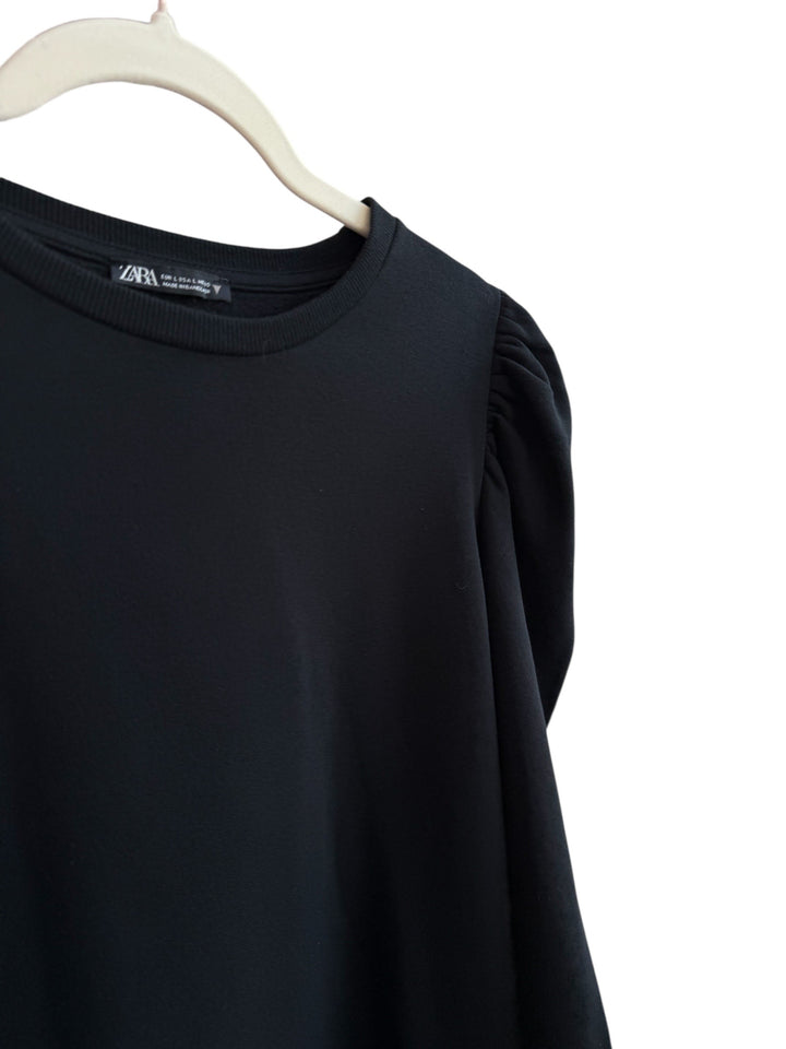 ReTrend black long-sleeve Zara dress with puffed shoulders, round neck, and straight cut. Size M.