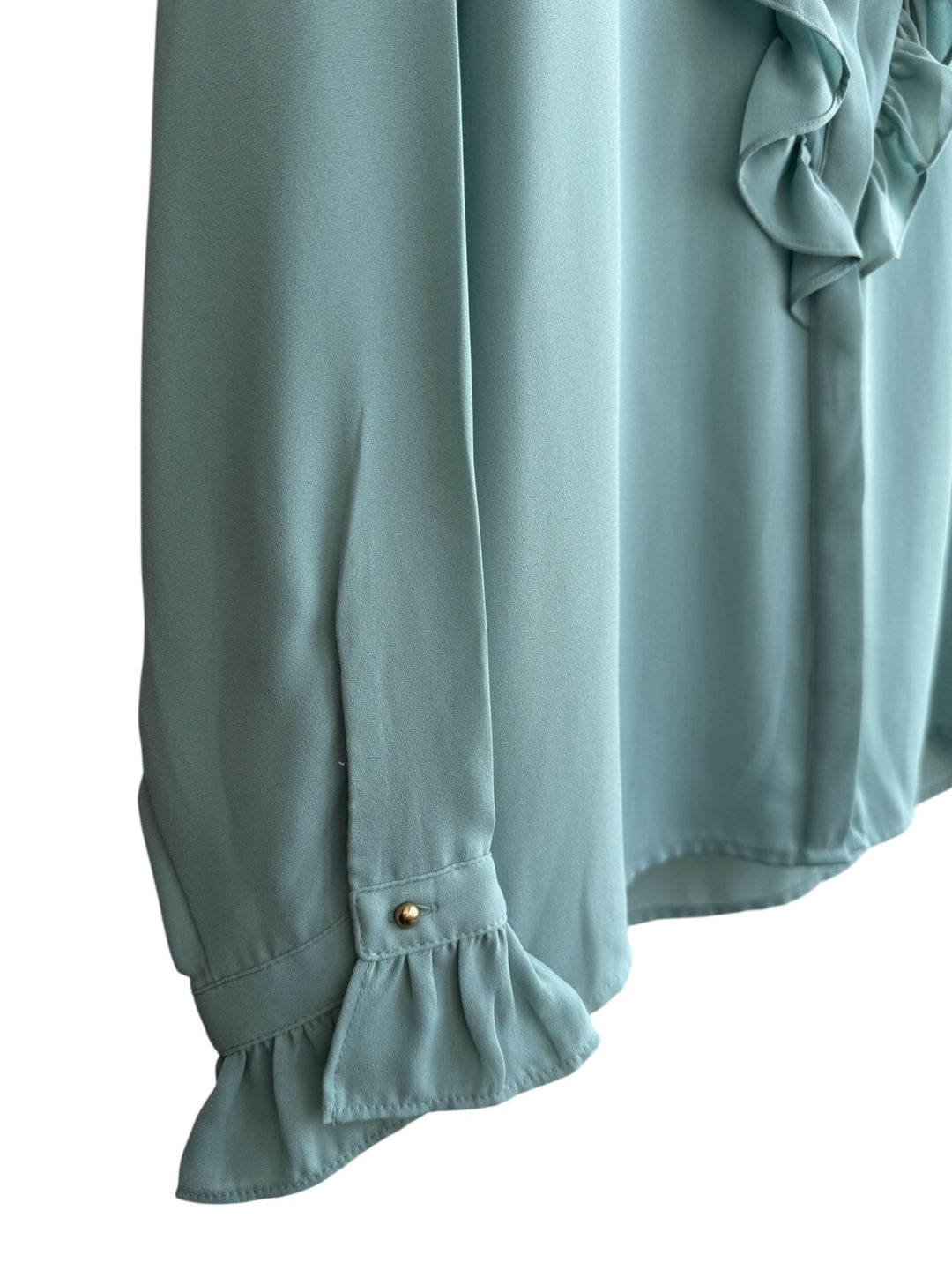 ReTrend Formula Joven water green flowing blouse with ruffled stand-up collar, ruffled front, and ruffled cuffs with buttons.