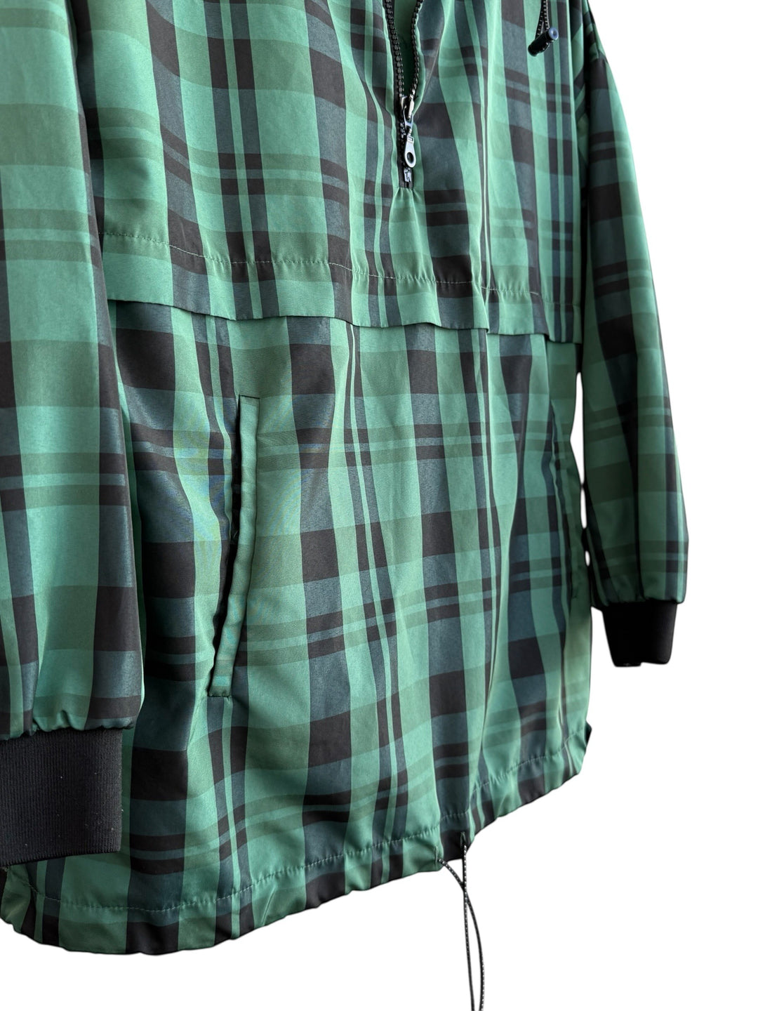 ReTrend green and black plaid lightweight jacket with hood, zip closure, and drawstring hem. Size S.