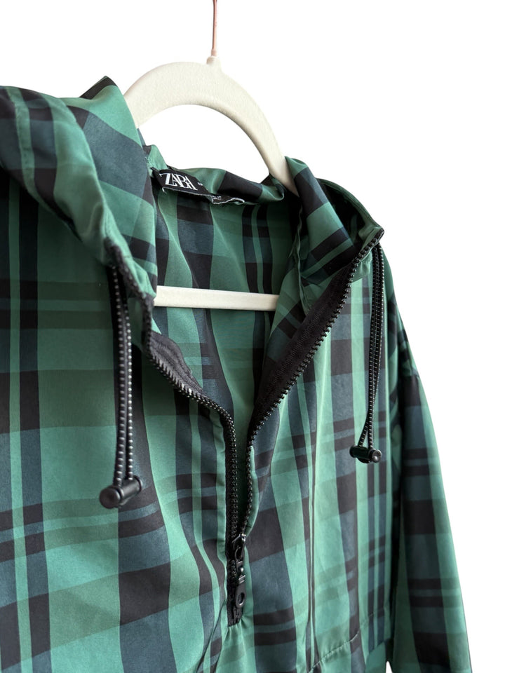 ReTrend green and black plaid lightweight jacket with hood, zip closure, and drawstring hem. Size S.