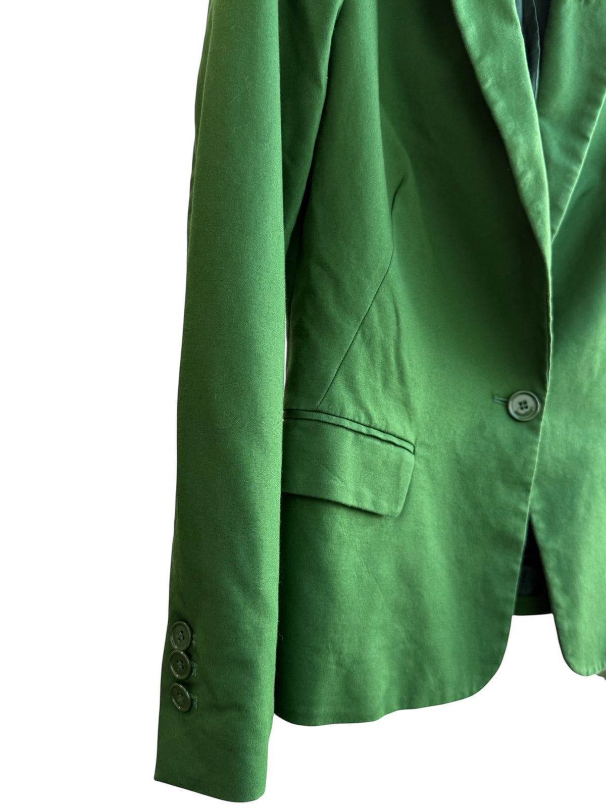 ReTrend green tailored blazer with single button closure, lapel collar, and flap pockets. Size M.