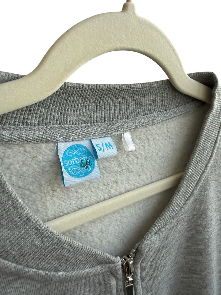 ReTrend grey zip-up sweatshirt with faux fur sleeves, size S/M. Comfortable and casual style.